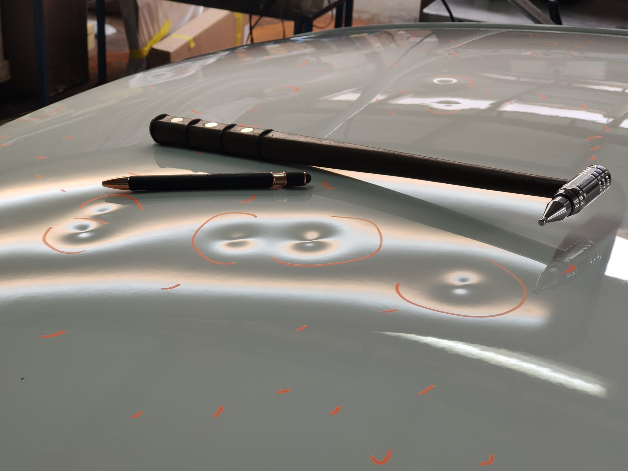 Hail damage before repair